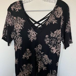 Black floral top, soft material.
